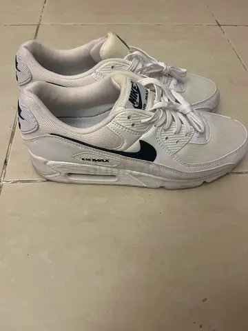 White Nike Air Max sneakers, lightly used, size not specified