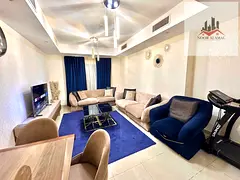 Sharjah, Al Taawun, Al Shati Tower 2: Spacious one-bedroom apartment with a living room and a maid's
