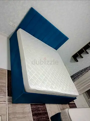 Blue upholstered double bed frame with mattress - new