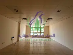 Spacious studio for rent in Al Majaz 2 on Jamal Abdul Nasser Street, featuring a separate kitchen, l