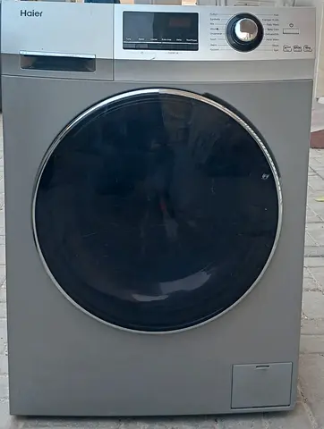 front load 8kg good working Haier washing machine, color is grey