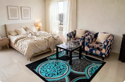Bed room sofa chairs, coffee table and rug