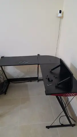 L-shaped corner gaming/office desk — black, good condition