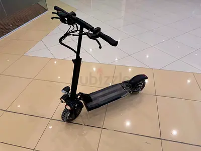 Used Black Electric Scooter — Good Condition, Ready to Ride