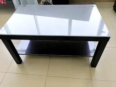 Teapoy table with glass top