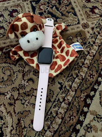 Used Apple Watch-style smartwatch in pink silicone band - good condition