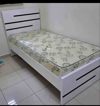 Brand New single wooden bed with madical mattress