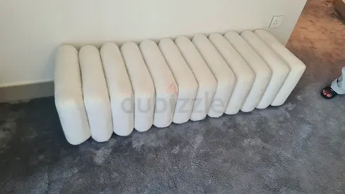 Long white upholstered bench / ottoman (good used condition)