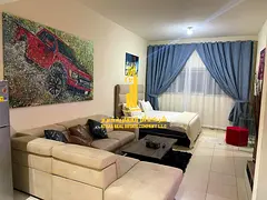 A luxurious studio open view with a semi-detached kitchen, fully furnished, elegant furniture and a 
