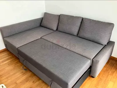 Grey L-shaped Sofa Bed with Storage - Good Condition
