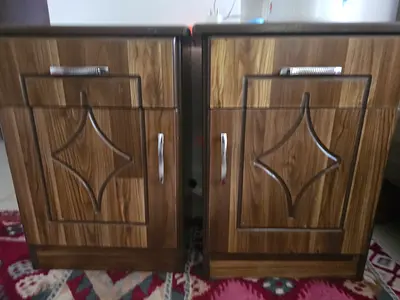 Pair of wooden bedside cabinets - good condition