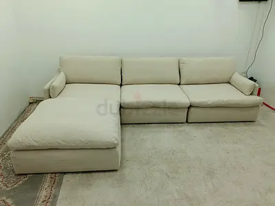 Very comfortable home center feather 🪶 filled modular sofa with ottoman