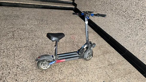 Used electric kick scooter with seat — good working condition