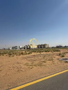 For sale: four adjoining plots of land in Al-Zubair Gardens in a very prime location, right across f