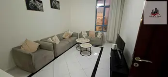 Furnished, north-facing one-bedroom apartment with a living room on Al Khan Corniche; ready for imm