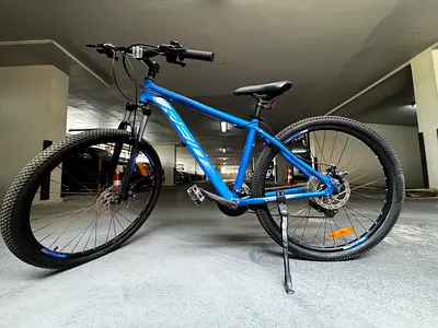 REID Well-maintained blue mountain bike, 26" wheels, front suspension