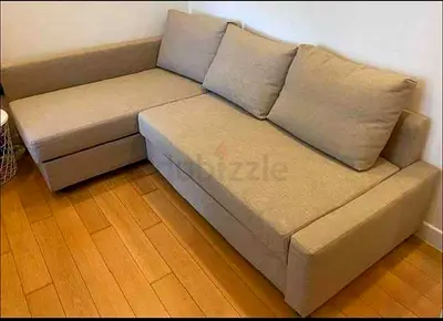 Beige L-shaped Sofa Bed with Storage - Good Condition