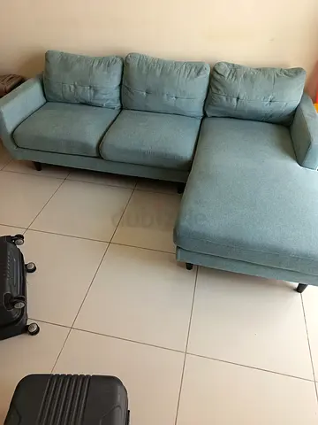Sofa with lounger for sale