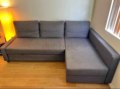 Gray L-shaped Sofa Bed with Storage - Good Condition
