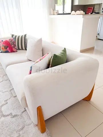 Light beige 3-seater sofa with wooden legs - excellent condition.