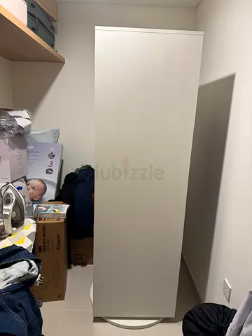 Single-door white wardrobe