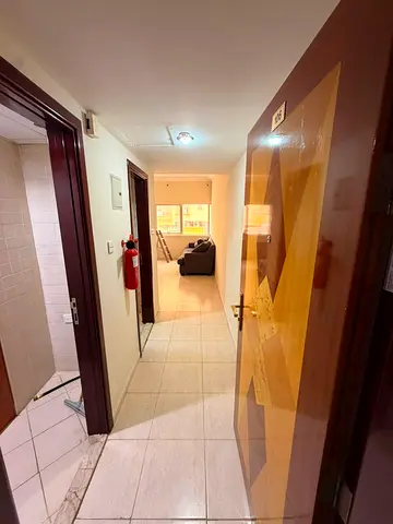 Studio for rent in Al Musalla Contract documentation included Separate kitchen Large space with a bar Covered parking available