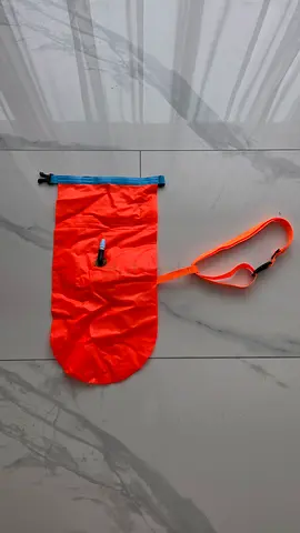 Orange waterproof dry bag with shoulder strap - lightweight