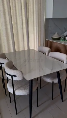 Modern Marble Dining Table with Four Boucle Chairs