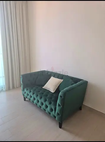 Green Velvet 2-Seater Sofa – Excellent Condition