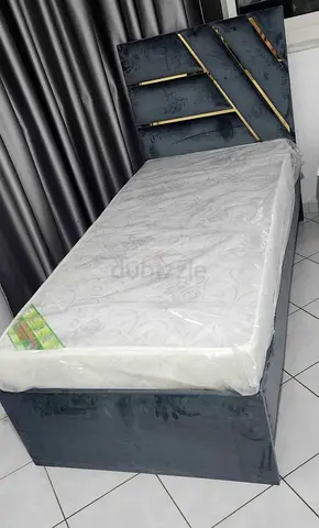 Single upholstered bed with mattress - compact velvet frame