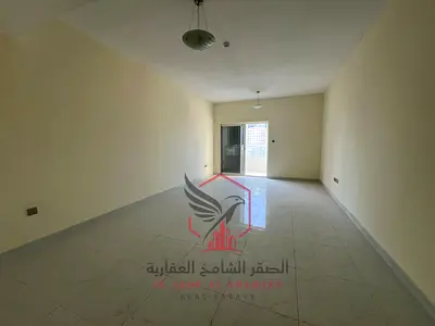 One month free, free parking, larger space, two rooms and a living room, master bedroom + large balcony, overlooking the main street, for rent in Al Q