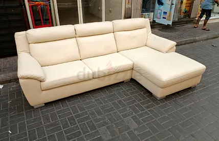 Cream leather L-shaped sofa Bed with chaise – good condition