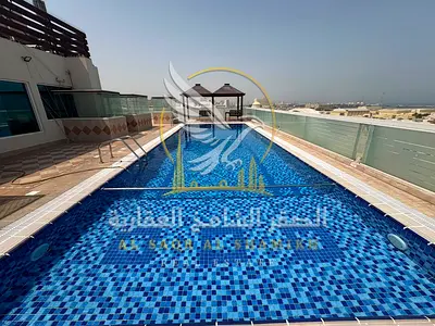 Two bedroom hall gym and pool free built in wardrobes balcony open view central AC spacious areas contract attestation by owner near the corniche
