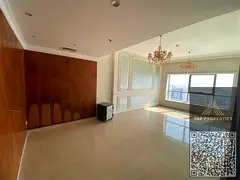 Two bedrooms and a living room. The bedroom is a master suite with a balcony offering an open view.