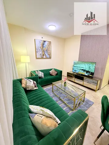 Sharjah, Al Qasimiya: Brand-new, hotel-style furnished apartment (first occupancy). Features a bedroom, living room, kitchen, and bathroom with super-