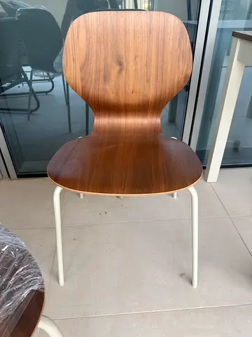 IKEA modern walnut shell chair with white legs