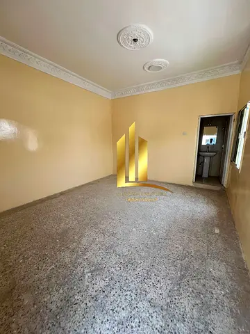 Traditional-style house for sale in Al Qadisiya, Sharjah.