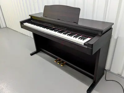 Roland HP330 piano Japan made with piano bench. Cash on free delivery with warranty..........