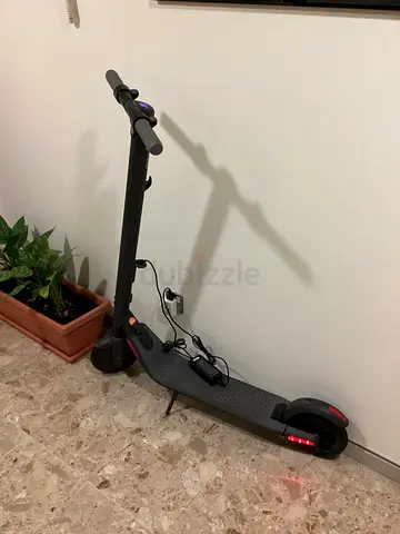 Used electric scooter in good condition - compact foldable model