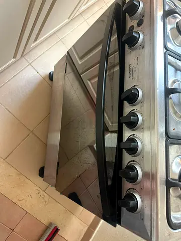 Used stainless steel gas cooker with oven - good working condition
