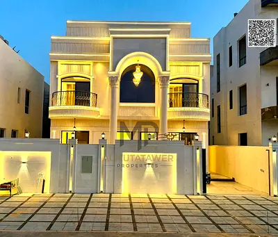 Luxury classic villa for sale in Al Helio 2 – Ajman | Full stone facade | Strategic location directly opposite Azhi Complex | Elegant design and luxur