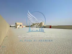 Open Yard for Rent in Al Sajaa – 20,000 Sq. Ft. on a Main Road