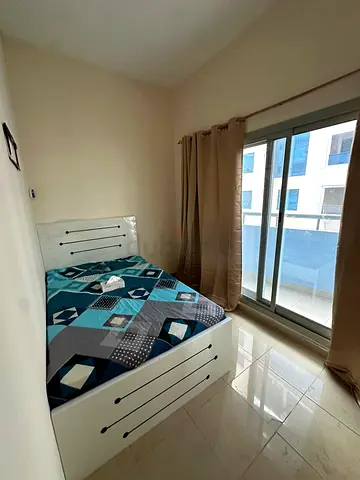 Couple partition big size with balcony attached available in al nahda 1 Dubai