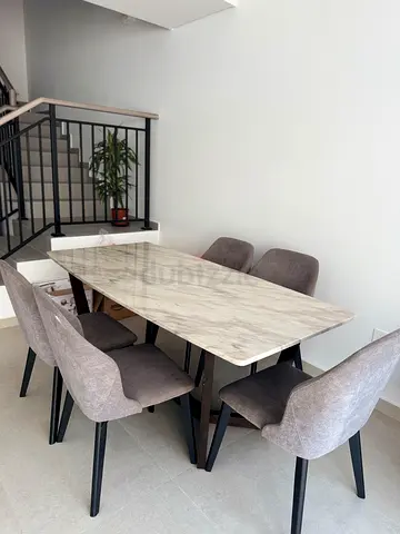 6-Seater Marble-Top Dining Table with Cushioned Chairs - Good Condition