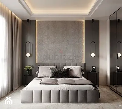 Modern grey upholstered bed with headboard and storage-ready base