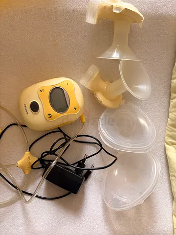 Medela electric breast pump with accessories - used
