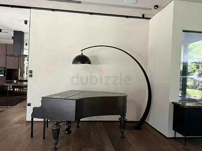 grand piano in good condition - dark wood finish