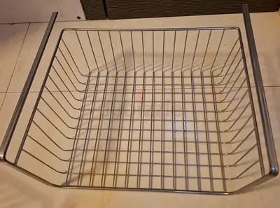 Under shelf storage basket
