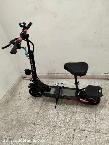 Electric Scooter with Seat — Dual Motor, Foldable, Good Condition