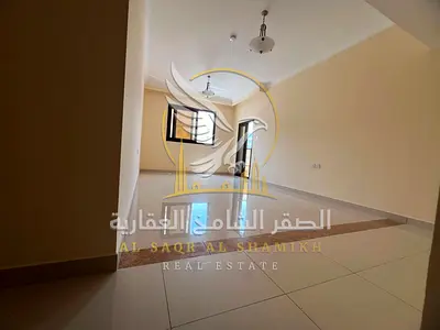 Two-bedroom apartment with living room for annual rent in Al Qulaya, Sharjah. Wardrobes and balcony.